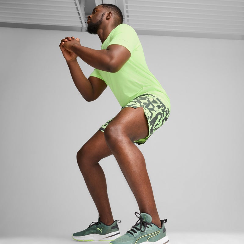 PUMA 7" Graphic Stretch Mens Green Woven Shorts - Image 3